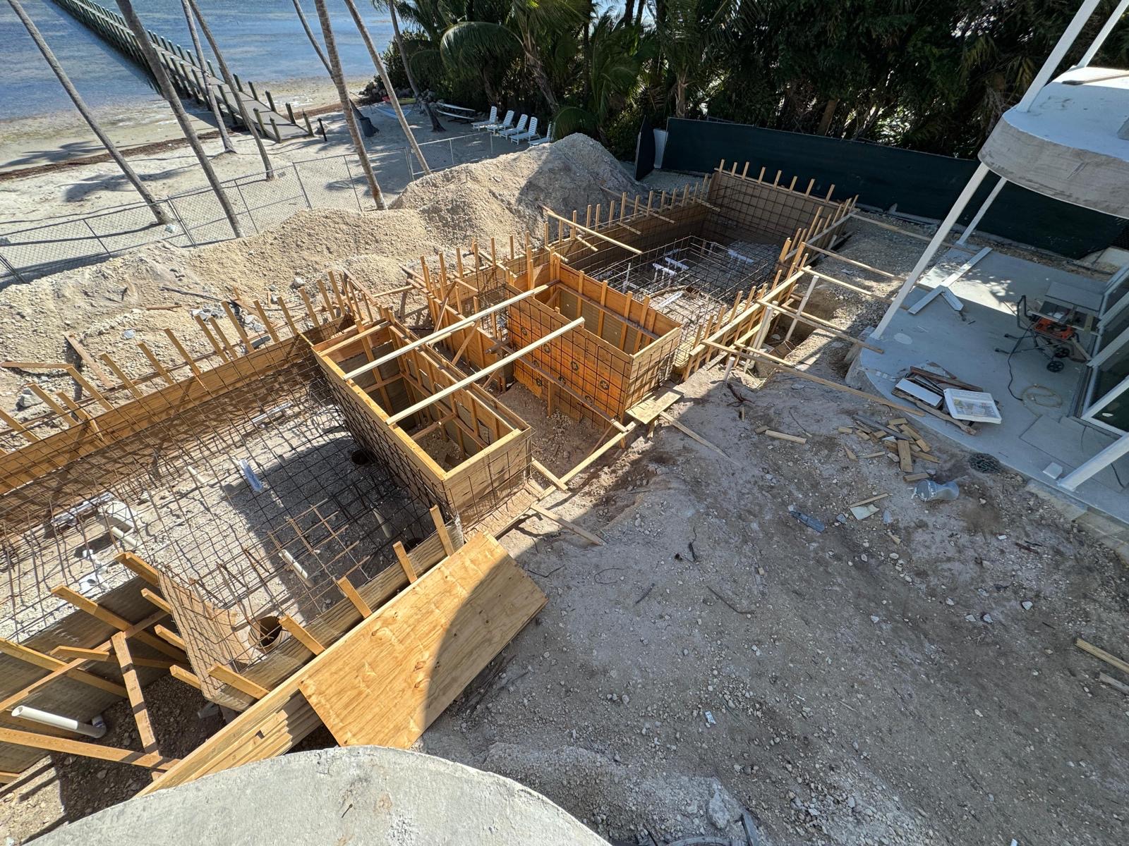 Deep residential pool shell near water