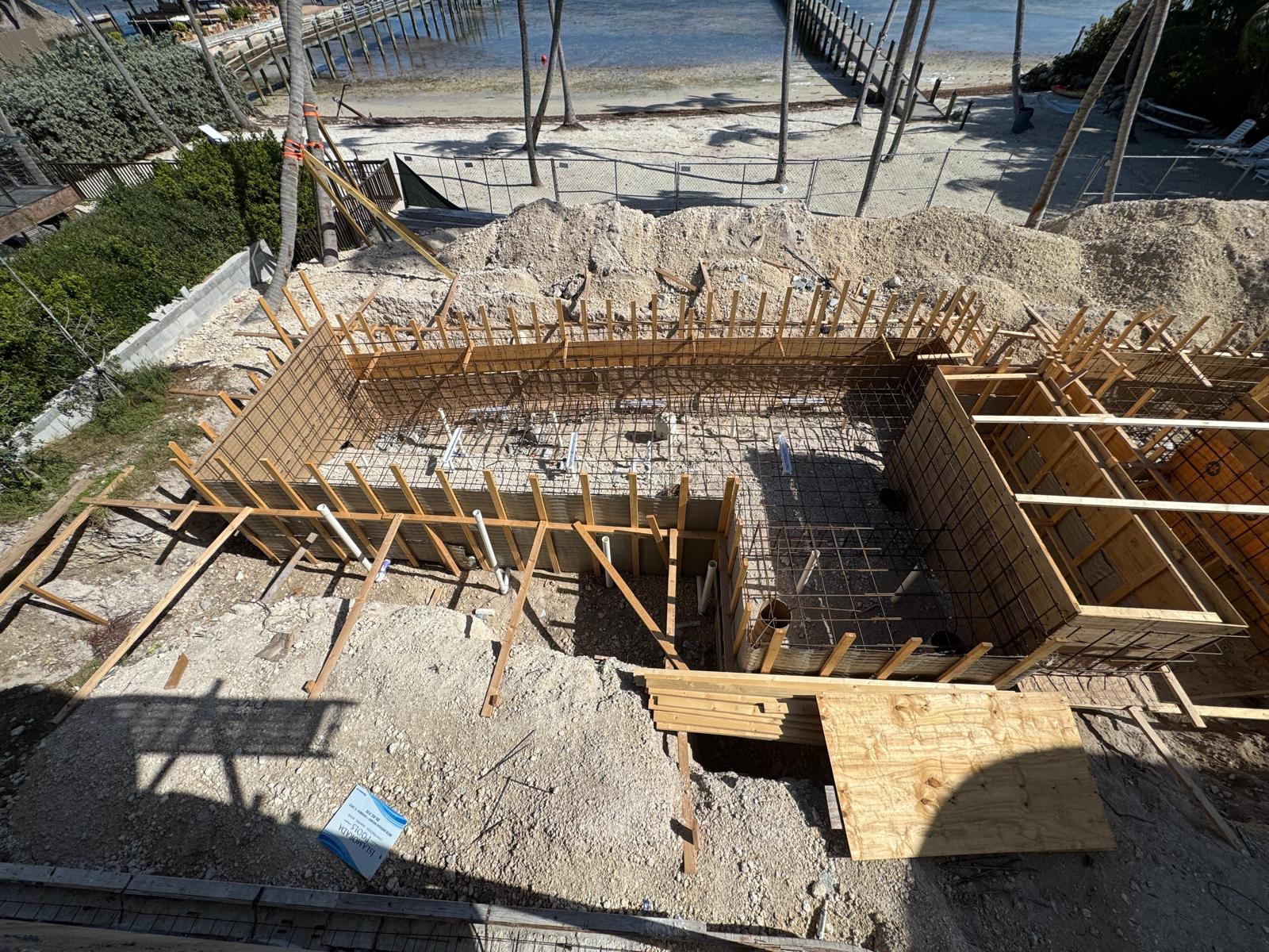 Pool shell construction during excavation phase